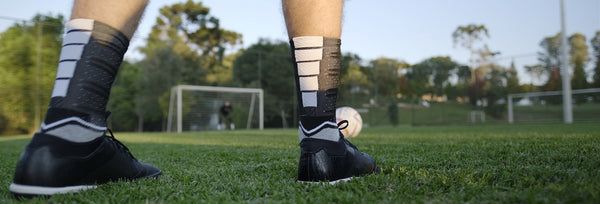 Meia antiderrapante com grip no campo